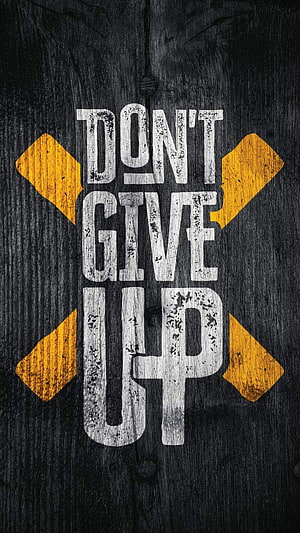 Inspirational Don't Give Up Typography on Dark Wood with Yellow Cross Accent HD phone wallpaper