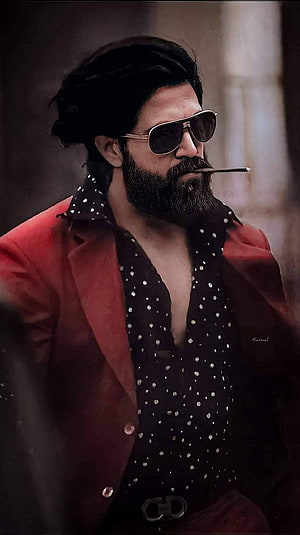 Yash as Rocky Bhai in KGF Chapter 2 with aviator sunglasses and cigar HD phone wallpaper