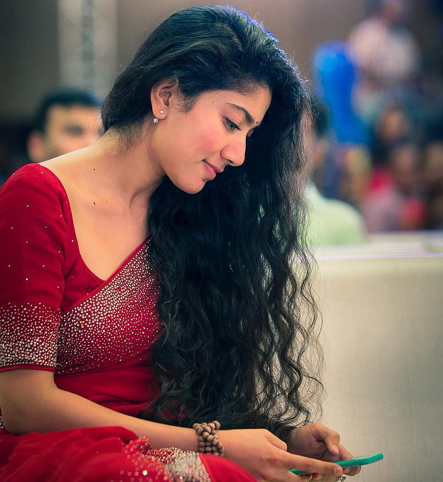 Sai Pallavi in a Red Embellished Saree with Long Wavy Hair HD phone wallpaper