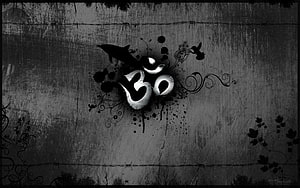 Grunge Om Symbol with Ink Splatters and Ornamental Floral Vines on Textured Background HD wallpaper