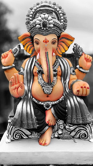 Ganesha Idol with Silver Ornamentation and Colorful Trunk Detail HD phone wallpaper