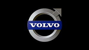 Volvo Automotive Brand Emblem With Metallic Iron Mark And Blue Banner On Black Background HD wallpaper
