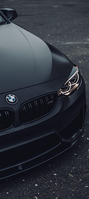 Matte Black BMW M5 Front Grille and Headlight Close-Up HD phone wallpaper