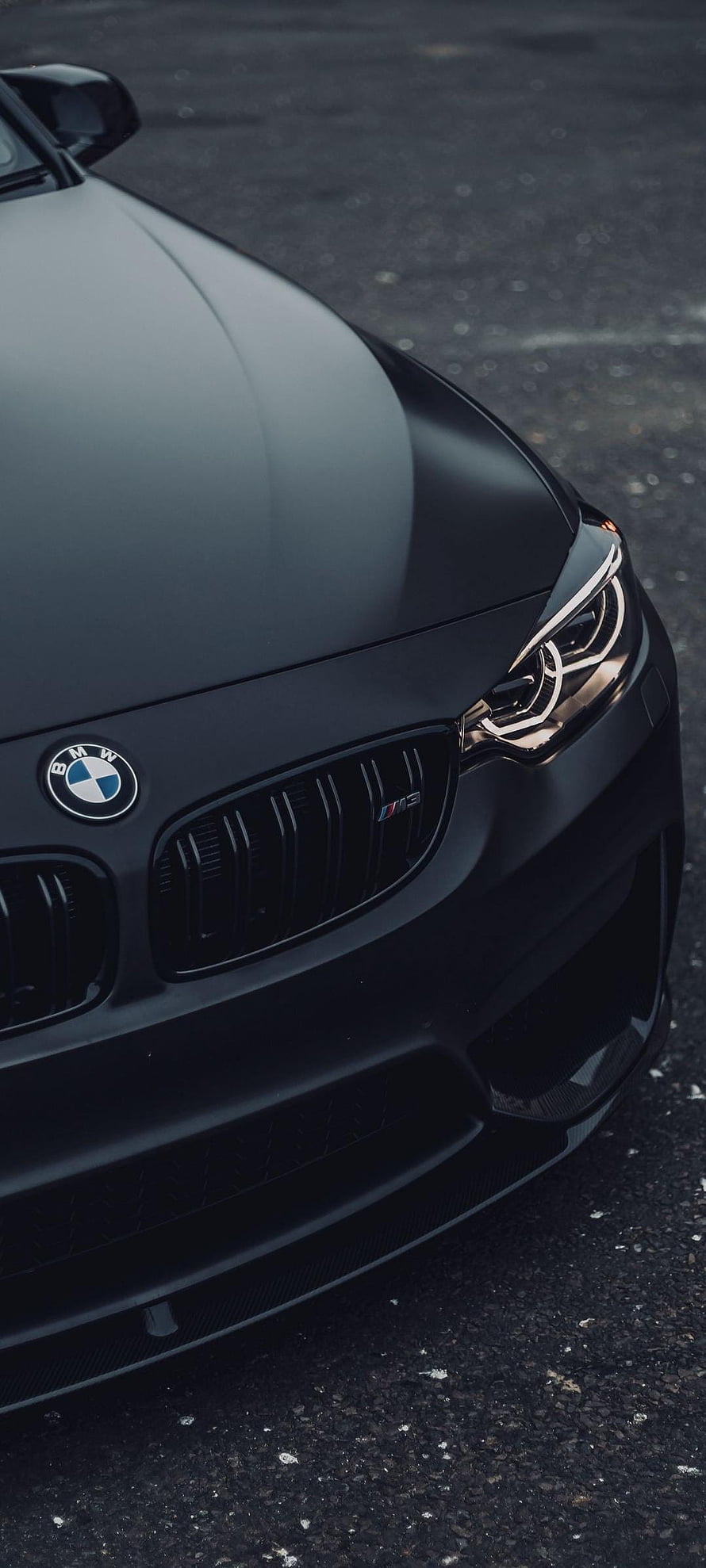 Matte Black BMW M5 Front Grille and Headlight Close-Up HD phone wallpaper