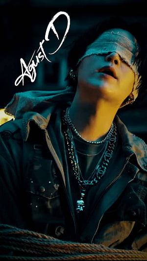 Agust D Portrait with Blindfold and Layered Chains in Moody Teal Lighting HD phone wallpaper