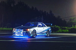Nissan Skyline GT-R R34 with Blue Underglow on Night Road HD wallpaper