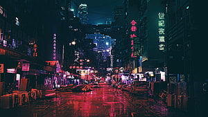 Neon-lit rainy street in a dense Asian city with glowing signs and parked cars HD wallpaper