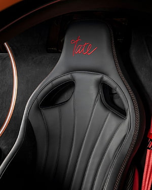 Andrew Tate Signature Leather Racing Seat with Red Embroidery and Carbon Fiber Trim HD phone wallpaper