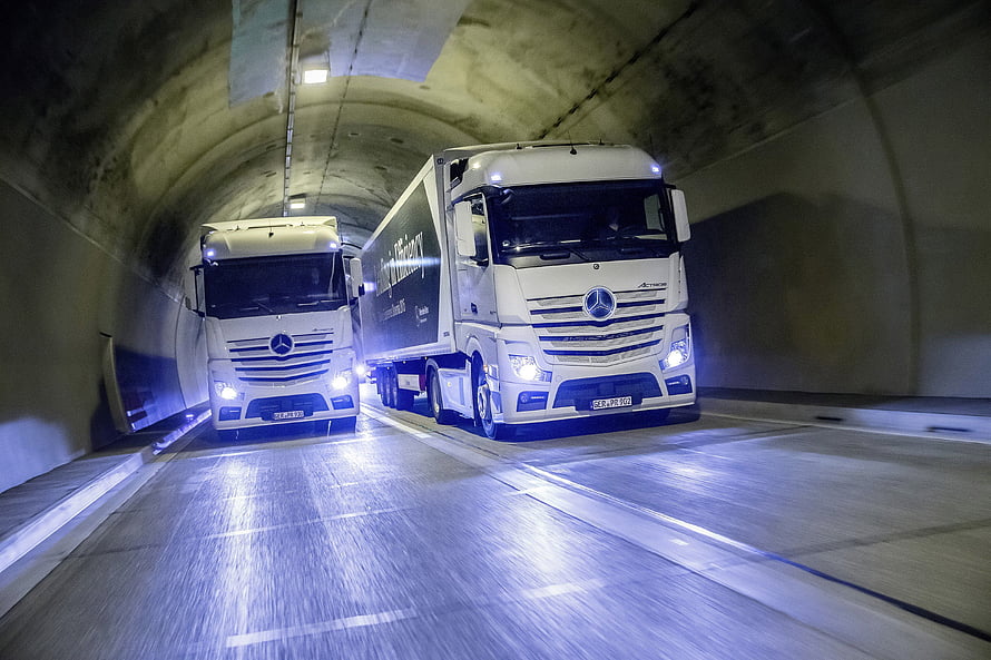 Mercedes-Benz Actros MP4 Trucks Driving Through Concrete Tunnel HD wallpaper
