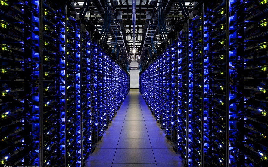 Vast Data Center Aisle with Glowing Blue Server Racks and Network Infrastructure HD wallpaper