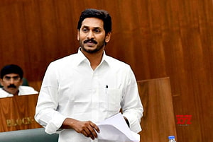 Y S Jagan Mohan Reddy in White Shirt Holding Documents in Parliamentary Chamber HD wallpaper
