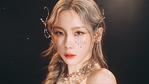 Taeyeon in Elegant Gold Jewelry and Crystal Face Adornments HD wallpaper