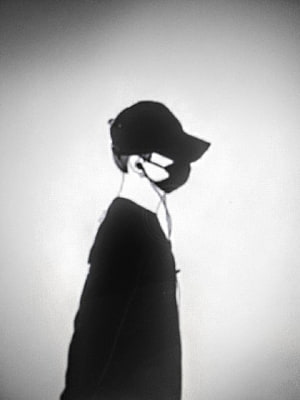 Monochrome Silhouette of a Boy in a Cap and Mask, Minimalist Profile Portrait HD phone wallpaper
