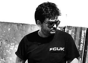 Puri Jagannadh in Black and White Portrait Wearing Sunglasses and Graphic T-Shirt HD wallpaper