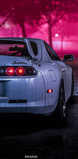 Silver Toyota Supra Rear View in Rain with Neon Pink Background HD phone wallpaper