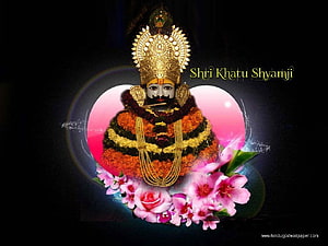 Khatu Shyamji deity adorned with vibrant floral garlands and golden crown HD wallpaper