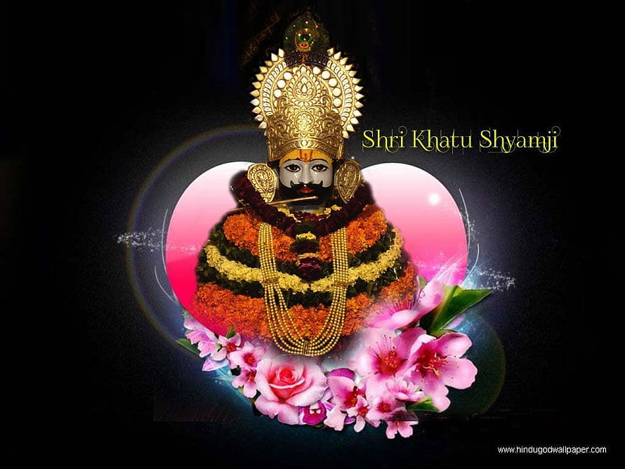 Khatu Shyamji deity adorned with vibrant floral garlands and golden crown HD wallpaper