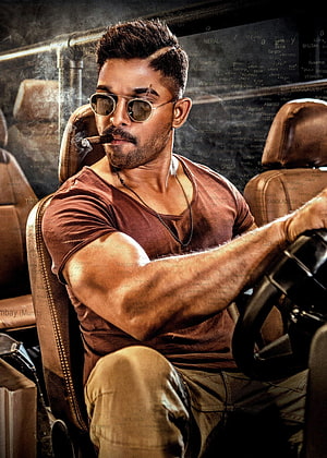 Allu Arjun in Aviator Sunglasses and Brown Tee Smoking a Cigar in a Car HD phone wallpaper