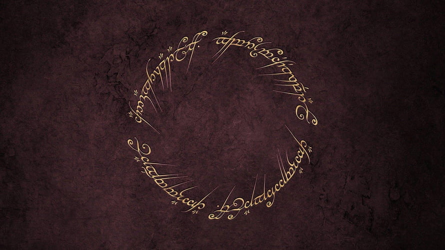 Elegant Elvish Calligraphy Circle on Dark Textured Background HD wallpaper