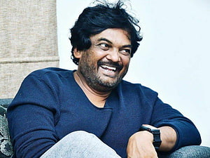 Puri Jagannadh smiling portrait in navy sweater HD wallpaper