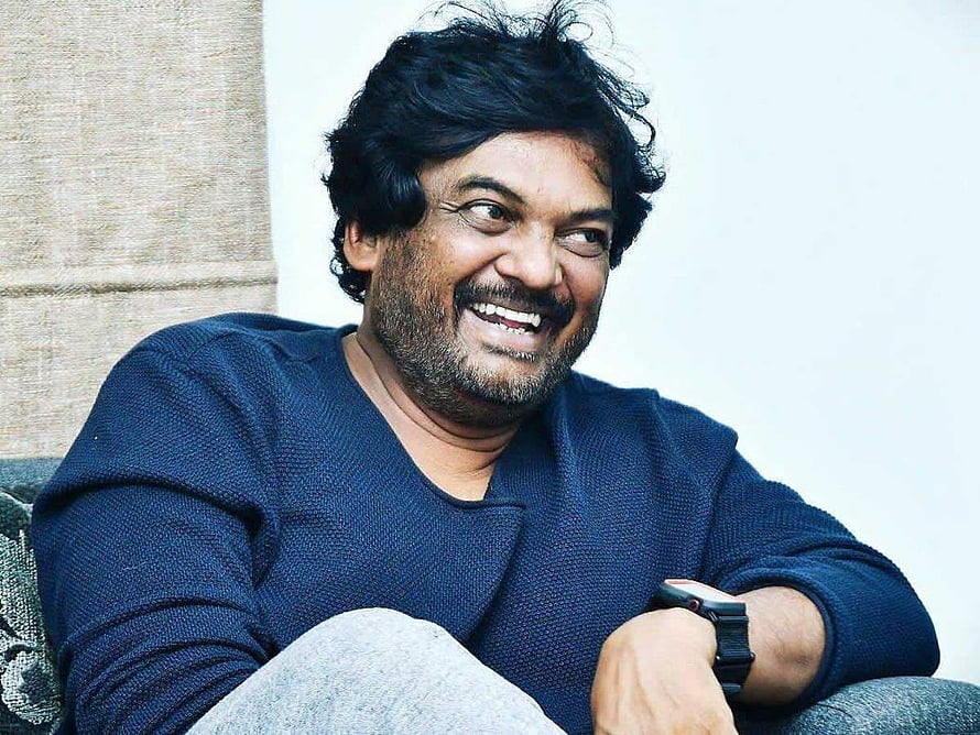 Puri Jagannadh smiling portrait in navy sweater HD wallpaper