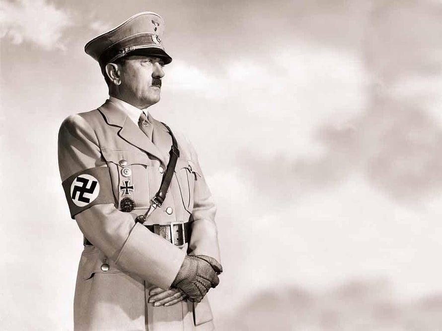 Adolf Hitler in Military Uniform Standing Against a Cloudy Sky HD wallpaper