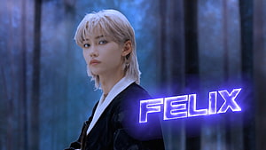 Stray Kids Felix in a moody forest setting with neon text overlay HD wallpaper