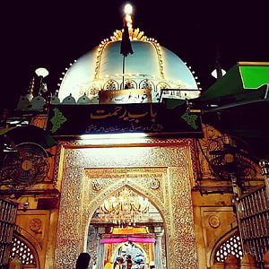 Ajmer Sharif Dargah at Night with Illuminated Dome and Ornate Golden Entrance HD phone wallpaper