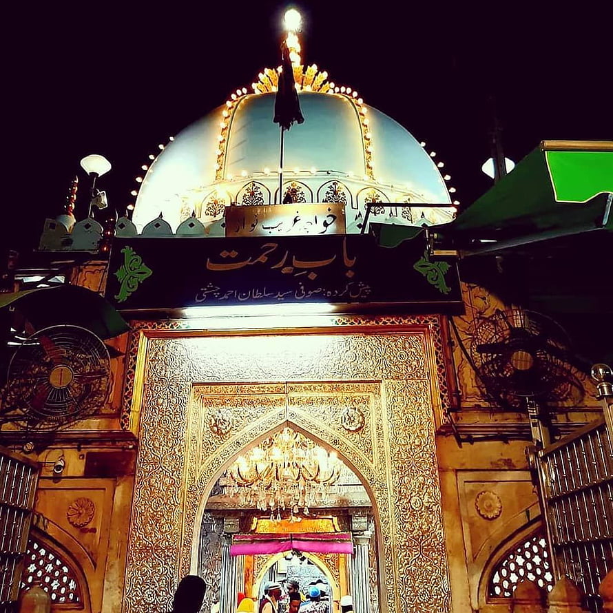 Ajmer Sharif Dargah at Night with Illuminated Dome and Ornate Golden Entrance HD phone wallpaper