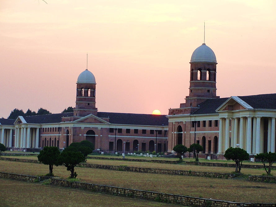Indian Military Academy Dehradun at Sunset with Twin Domes and Classical Columns HD wallpaper