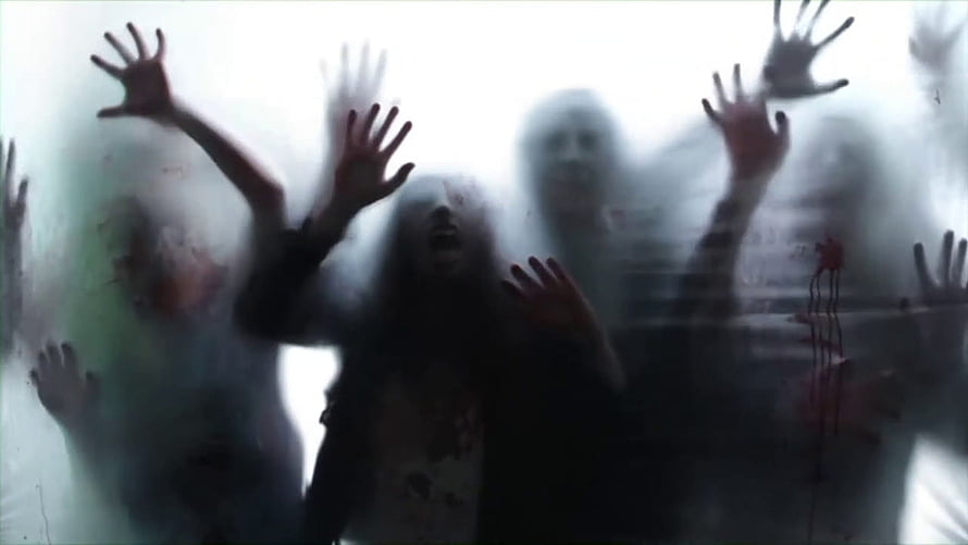 Horror Scene of Zombies Pressing Against a Foggy Glass Wall with Blood Stains HD wallpaper
