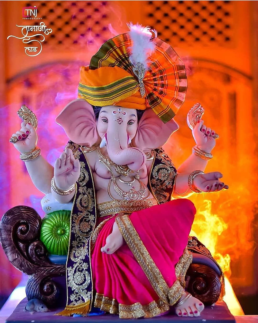Ornate Ganesha Murti in Traditional Attire with Turban and Jewels HD phone wallpaper