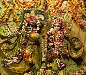 Sri Sri Radha Shyamasundara Deity Statues Adorned With Fresh Flower Garlands HD wallpaper