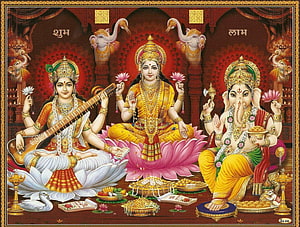 Saraswati and Lakshmi with Ganesha on Lotus Thrones in Traditional Indian Temple Art HD wallpaper