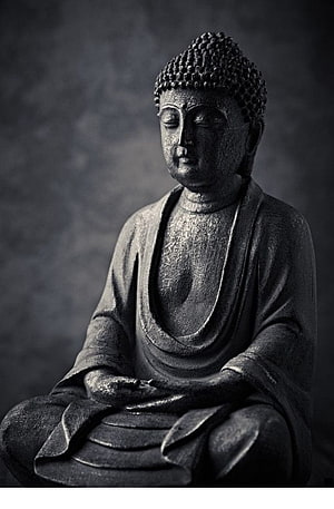 Serene Black and White Buddha Statue in Meditation Pose HD phone wallpaper