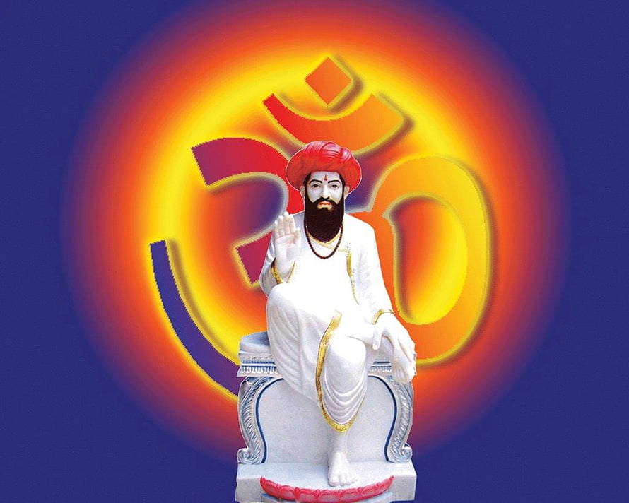 Sant Sevalal Maharaj Statue Seated on Throne with Om Symbol and Radiant Aura HD wallpaper