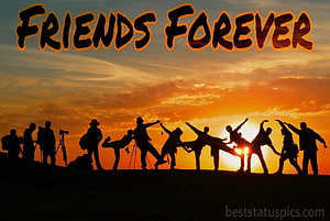 Silhouetted Group of Friends Celebrating at Sunset with Friendship Text Overlay HD wallpaper