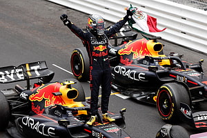 Checo Perez Celebrates Victory in Red Bull Racing Formula 1 Car HD wallpaper