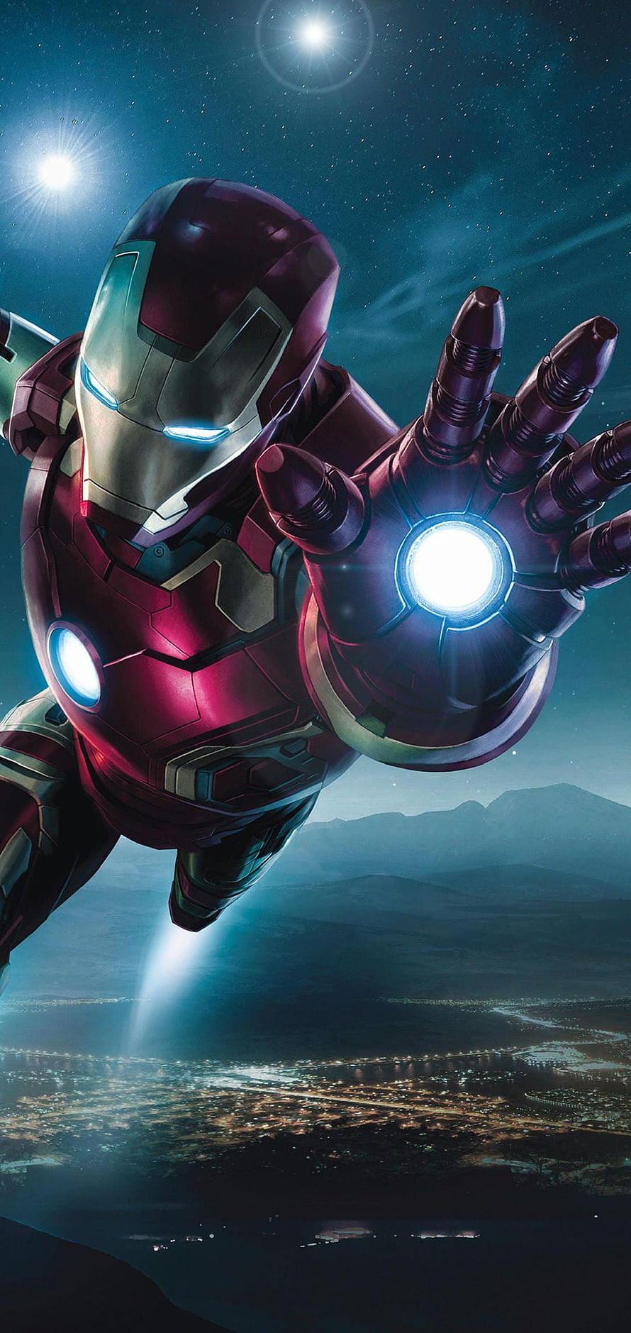 Iron Man flying over a city at night with glowing repulsor hand and arc reactor HD phone wallpaper