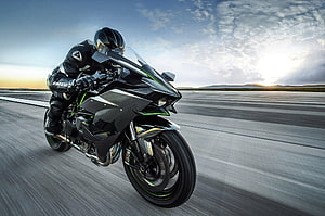 Kawasaki Ninja H2R Superbike Speeding on Open Runway at Sunset HD wallpaper