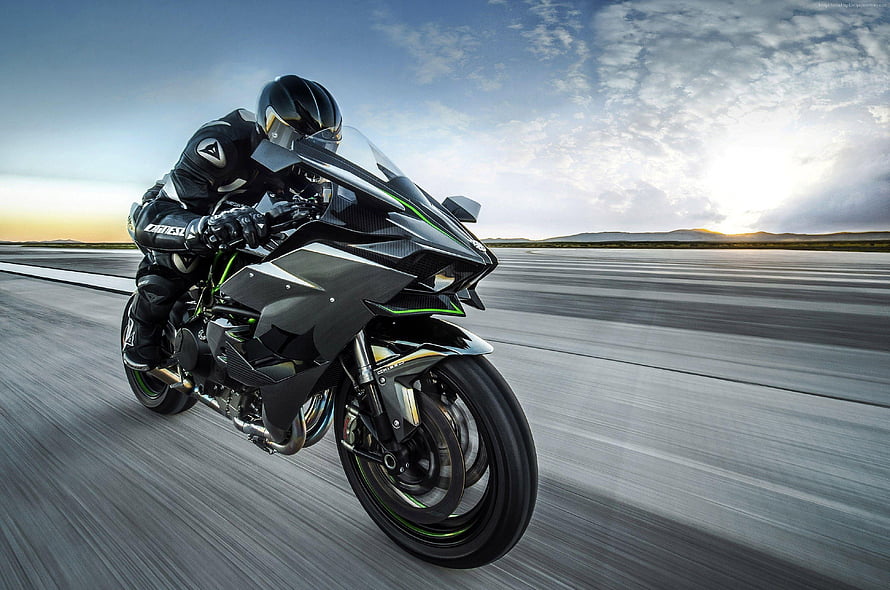 Kawasaki Ninja H2R Superbike Speeding on Open Runway at Sunset HD wallpaper