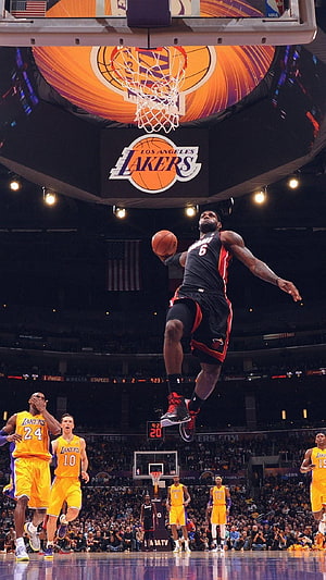 LeBron James dunking over Kobe Bryant and Lakers players at Staples Center HD phone wallpaper