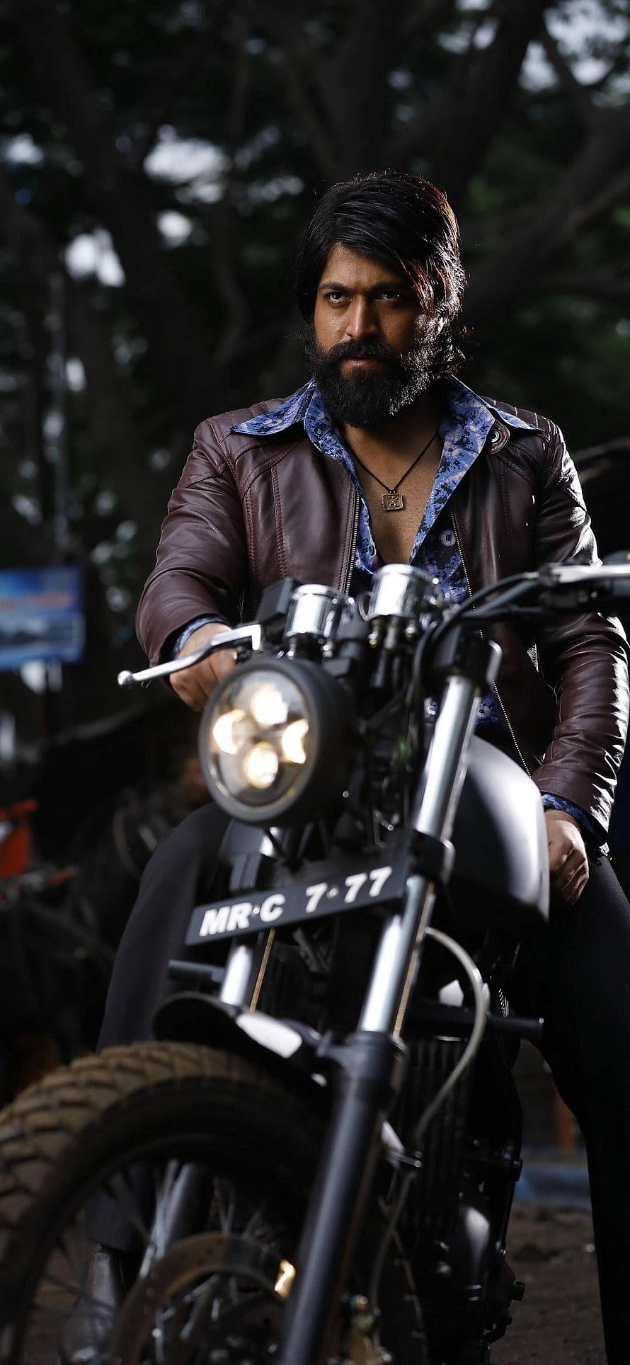 Rocky Bhai from KGF on a Custom Motorcycle in a Dark Forest Setting HD phone wallpaper