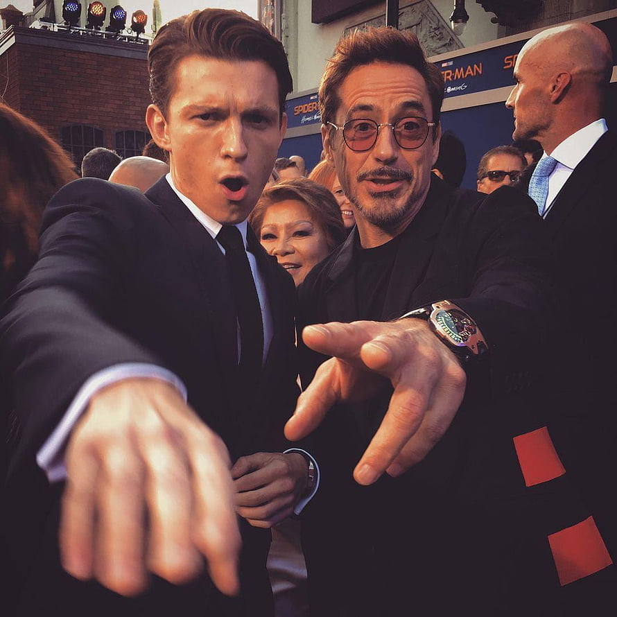 Tom Holland and Robert Downey Jr. Pointing at Camera at Spider-Man Premiere HD phone wallpaper