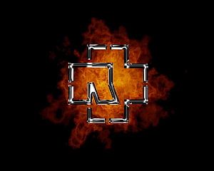 Rammstein Band Logo with Fiery Orange Smoke on Black Background HD wallpaper