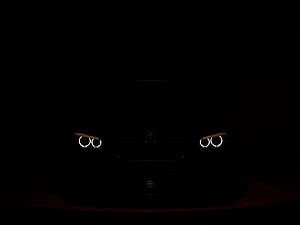 BMW M Power Front Headlights Glowing in Darkness HD wallpaper