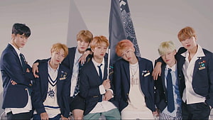 NCT DREAM Members in Navy Blazers and Ties with Flag HD wallpaper