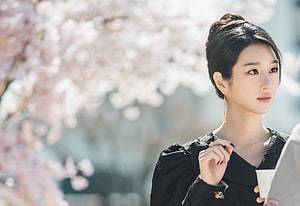 Seo Ye-ji in Black Dress Under Cherry Blossoms from It's Okay to Not Be Okay HD wallpaper