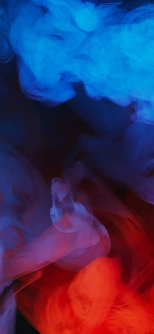 Vibrant Blue and Red Smoke Swirling in Dark Abstract Composition HD phone wallpaper