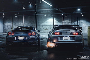 Nissan GT-R and Toyota Supra Rear View in Dark Parking Garage HD wallpaper